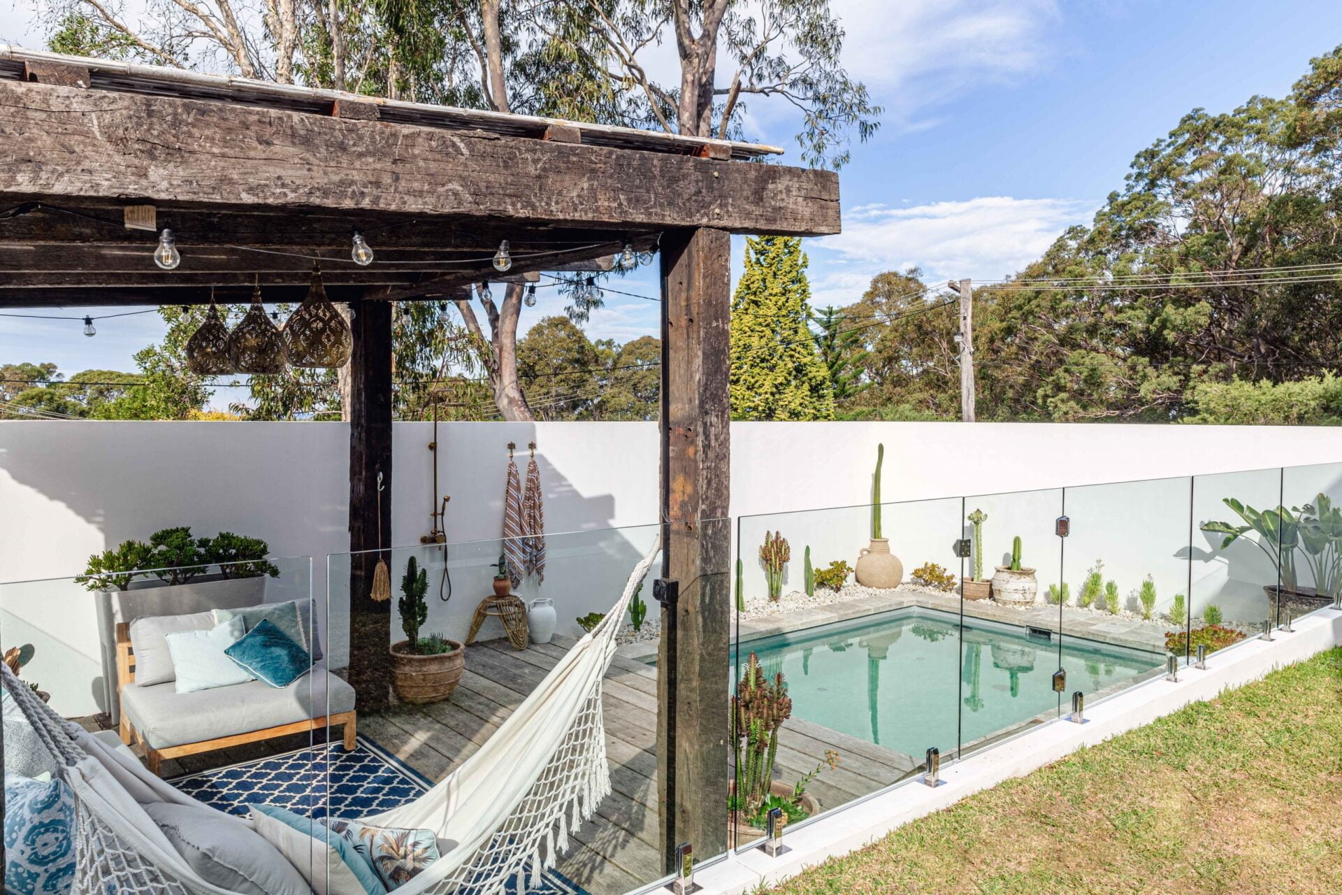 Backyard plunge pool in Southern Lake Macquarie with a recycled timber cabana
